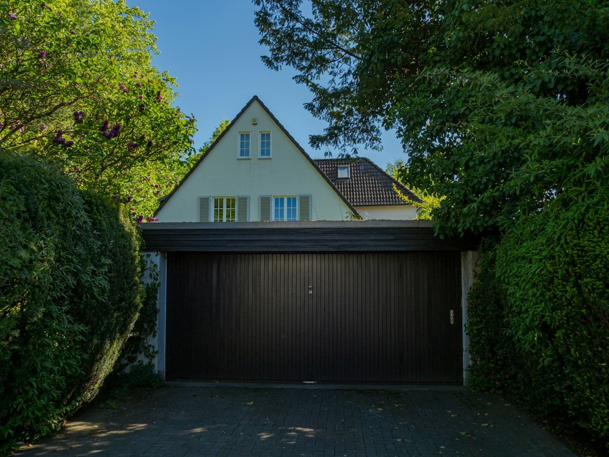House with a wide double garage door